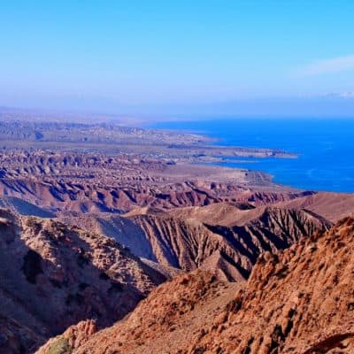 Aksai canyons with a panoramic view of Issyk Kul | Travel Land